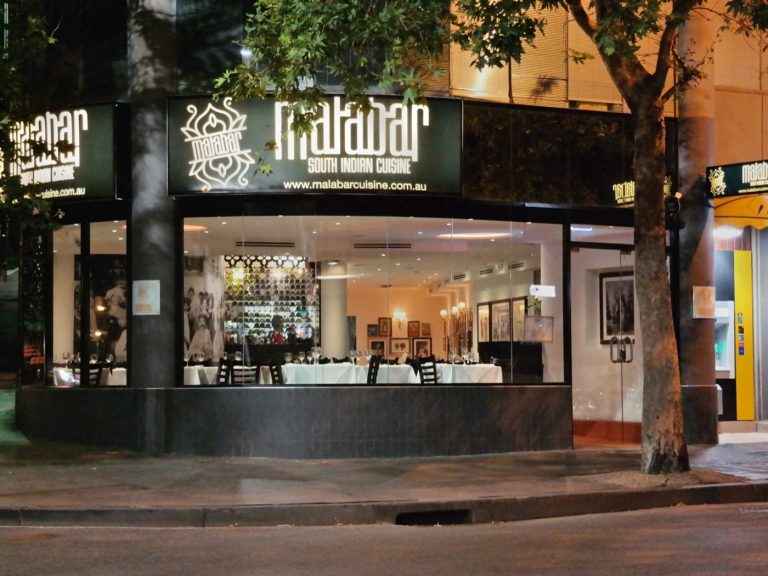 Malabar Darlinghurst shopfront on Victoria Street at night